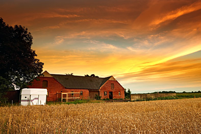 Bauernhof-Sonnenuntergang